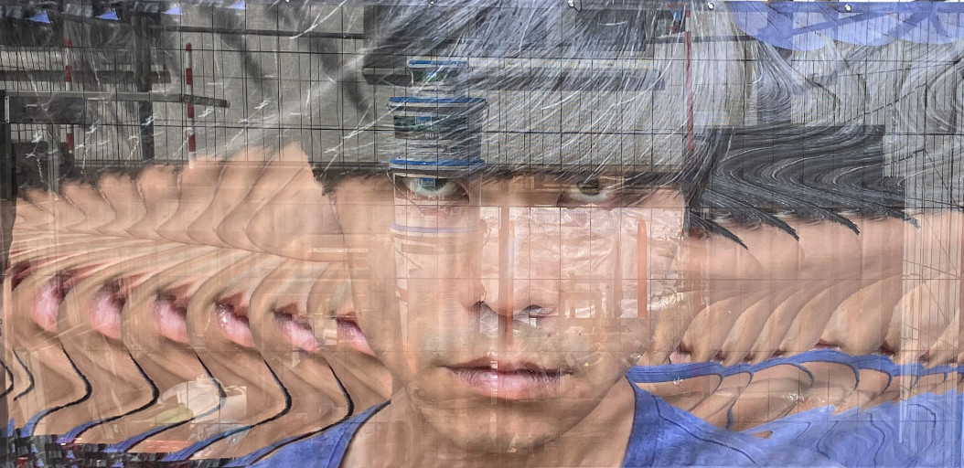 photo of naoto printed as a banner